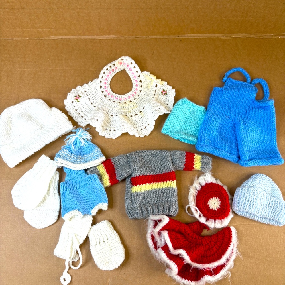 Lot of vintage handmade knit winter accessories and doll clothes. Various sizes.